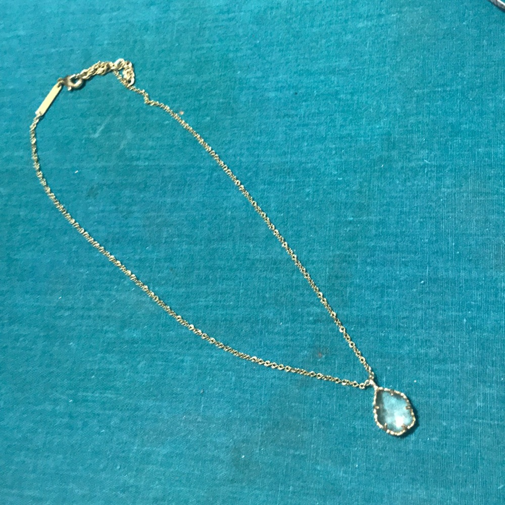 Kendra Scott gold necklace with clear stone